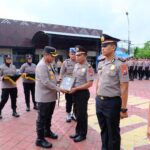 Kapolres Ngawi Pimpin Upacara Laporan Kenaikan Pangkat 61 Anggota 