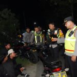 Polres Ponorogo Bersama TNI Gelar Patroli Skala Besar Pengesahan Warga PSHT Ranting Jetis Berjalan Kondusif