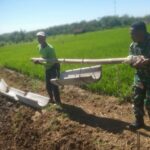 Bersama Warga Anggota Koramil Jogorogo Gotong Royong Bangun Saluran Irigasi