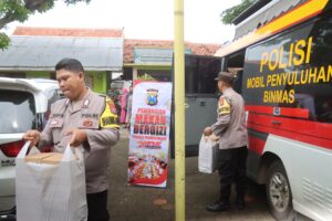 Wujudkan Asta Cita, Polres Probolinggo Berbagi Makanan Bergizi Untuk Siswa Sekolah Dasar