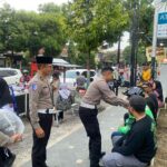 Operasi Patuh Semeru 2025, Polres Ponorogo Beri Helm Gratis untuk Ojol